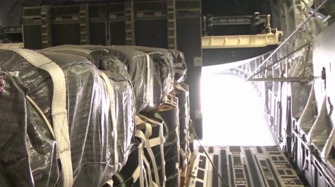 C-17A Globemaster III crew members  load pallets at Kandahar Airfield Stock Footage 33084723