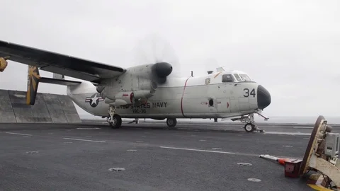 C-2 Greyhound Ready for Launch Aboard the Flight Deck of Aircraft Carrier  Video stock 82709219