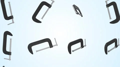 C Clamps Falling on a Light Blue Background. Stylized Clamps 3D Animation. 4K Stock Footage 307629918