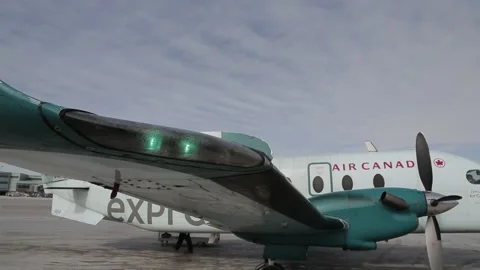 C-GAAU - Static Shot of Small Airplane Wing While its on Ground Video stock 219374110