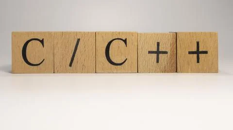 The C plus code chain is built from wooden cubes. Industry and technology. c Foto stock