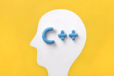 C++ programming language sign inside a humans head. Concept of programming le Foto stock
