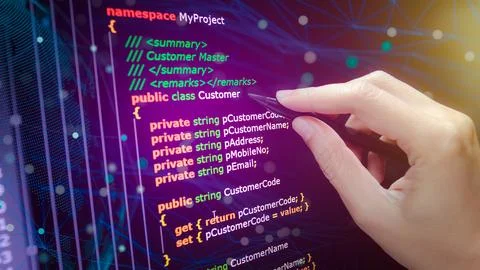 C sharp programming language source code example on monitor, C# source code. Фото
