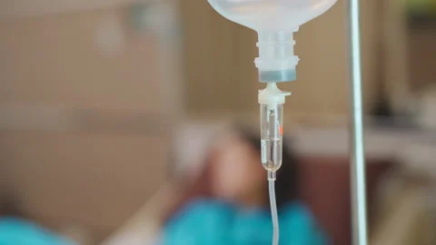 C0006 Close up of saline solution with syringe line to patient  Video stock 203902662