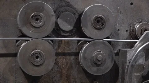 C0012    FEEDING OF STEEL THREAD ON SPRING MACHINE Stock Footage 105903571