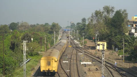 C0013 train Indian railway level crossing India Stock Footage 270195987