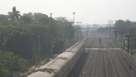 C0018 train Indian railway level crossing India Stock Footage 270969994