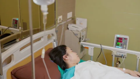 C0036 Patient laying down on bed after surgery Video stock 205213628