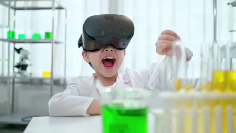 C0041 Kid using VR technology and learning chemistry Stock Footage 206090153