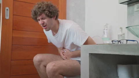 C0085 man constipation in the bathroom  Stock Footage 208089510