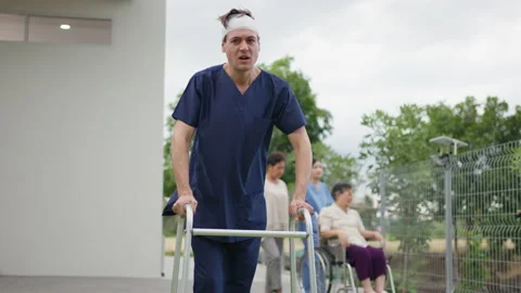 C0235 Patient using walker and walk in the garden Видео 209274945
