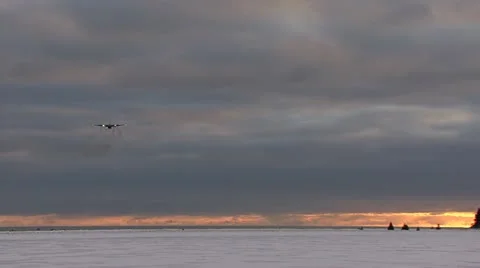 C130 On Approach Flyover in Evening Stock Footage 10828241