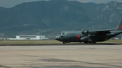 C130 moving against mountainous background (HD) c 스톡 동영상 11898021