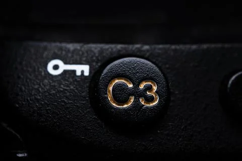 The C3 Custom Key button is close on the camera. Old and dirty Stock-Fotos