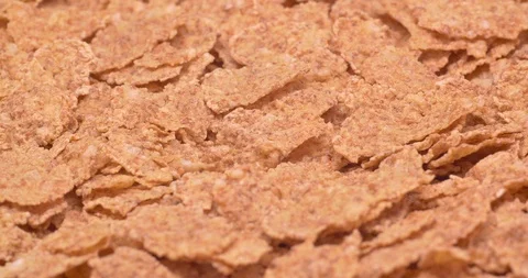 C4K closeup shot of the cereal flakes on a rotating stand Stockbeeldmateriaal 99042202
