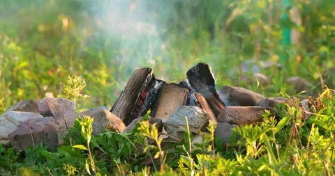 C4K shot of the campfire burning at sunset Stock-Footage 116706047