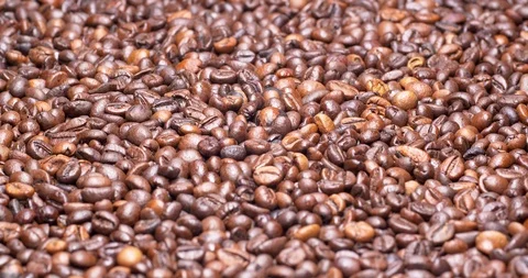 C4K shot of the roasted coffee beans on a turntable Stock-Footage 102754744