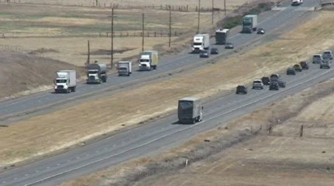 CA Central Valley I-5 lots of trucks Stock Footage 10737623