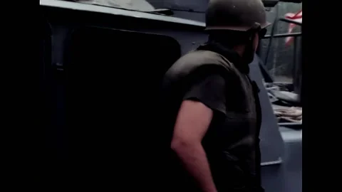 CA MAU - 1969 - US crew members fire M16 rifles on the patrol craft deck, and Stock Footage 316682187