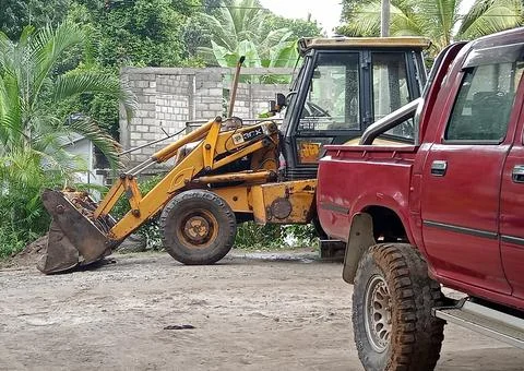 Cab and a JCB Stock Photos