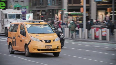 Cab driving by in Time Square Stock Footage 173345168
