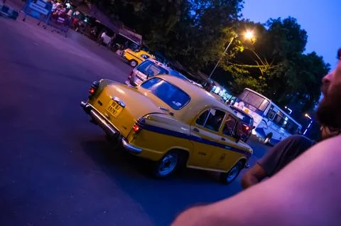 A cab at night Stock-Fotos