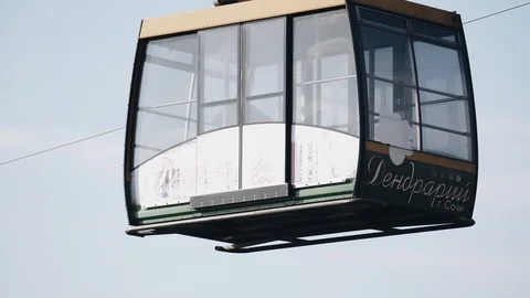The cab rides the cable car from left to right Stock Footage 122774626