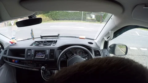 In cab shot of a man struggling to pull out from a junction on the A20, Stock Footage 118502151