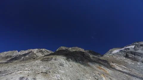 Cabane de Moiry in the cloud shadow wide 스톡 사진