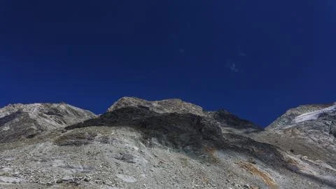 Cabane de Moiry in the cloud shadow 스톡 사진