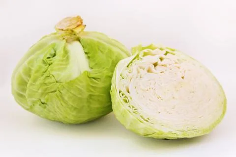 Cabbage and half cabbage on a white background Stock Photos
