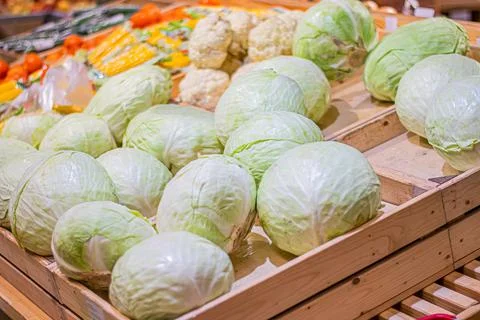 The cabbage in the boxes in the stores Stock Photos