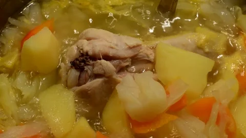 Cabbage chicken drumstick soup Stock Footage 273614318