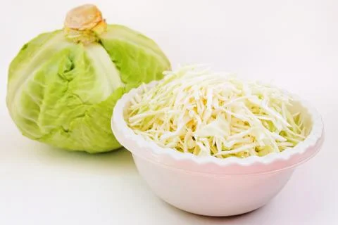 Cabbage with a cup of shredded cabbage 库存照片