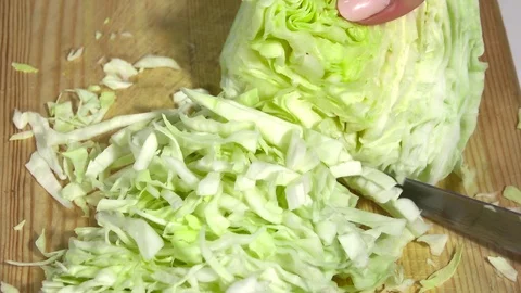 Cabbage is cut for salad 動画素材 105646715