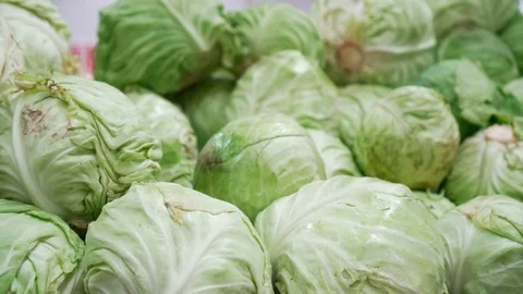 Cabbage lying on the counter in the supermarket Stock Footage 121116082