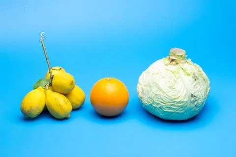 Cabbage, orange and lemon Stock Photos