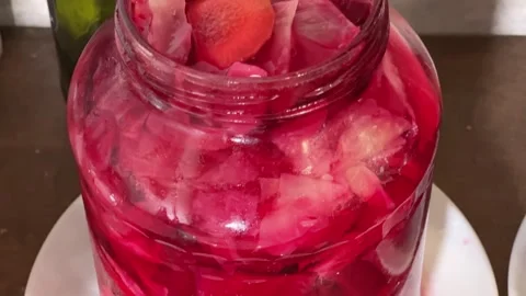 Cabbage pickled with beetroot and carrot in jar Stock Footage 273037270