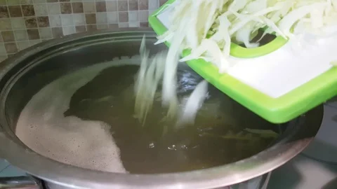 The cabbage is poured into a saucepan Video stock 86307217
