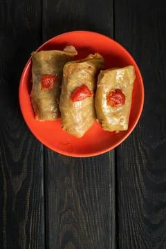 Cabbage rolls with beef, rice and vegetables on the plate. Stuffed cabbage Stock Photos