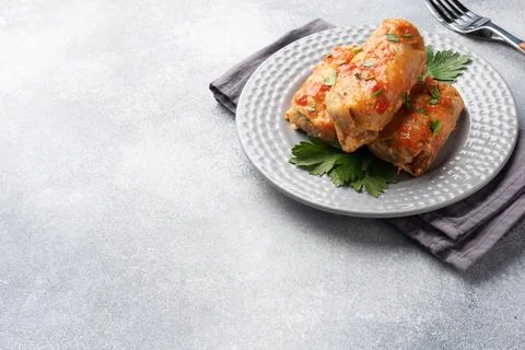 Cabbage rolls with beef, rice and vegetables on the plate. Stuffed cabbage .. 스톡 사진