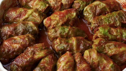 Cabbage Rolls Stuffed with Meat and Rice in Tomato Sauce. Close-up of tradi.. Stock Footage 331215173