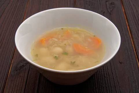 Cabbage soup with vegetables on a table Foto stock