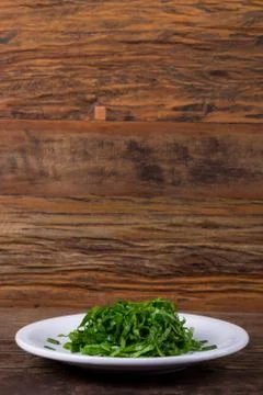 Cabbage on a white plate on a table Stock Photos