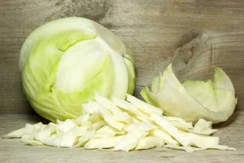 Cabbage on wooden background Stock Photos