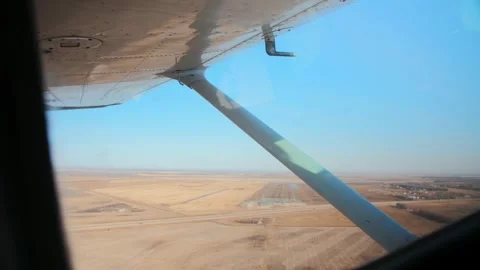 Cabin Airplane view from small aviation.Flying by aircraft sky landscape horizon Stock Footage 253240642