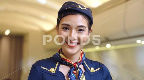 Cabin crew or air hostess working in airplane ~ Premium Photo #144456374