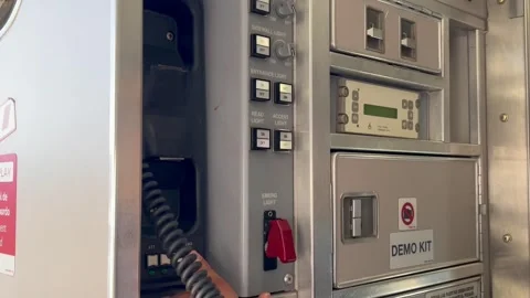 Cabin crew using the PA system to address the passengers in a modern jet Stock-Footage 258431404