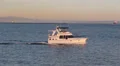 Cabin Cruiser at Sunset HD Footage