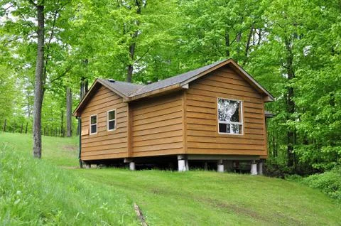 Cabin in the forest Stock Photos
